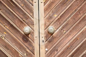 door in italy old ancian wood and traditional               texture nail