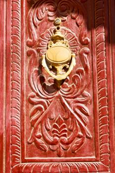 in oman antique door entrance and      decorative handle for background