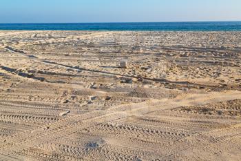near sandy beach sky     and mountain in oman arabic sea  