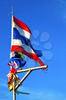 asia  kho samu bay isle waving flag    in thailand and south china  sea 