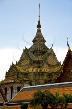 bangkok in   temple  thailand abstract cross colors roof  wat     asia sky   and  colors religion mosaic rain 
