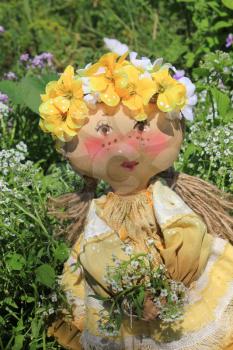Russian homemade rag doll as symbol of summer