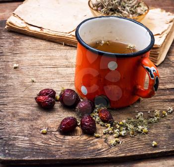 Cup of decoction of medicinal herbs according to the ancient recipe