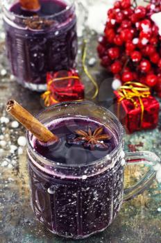Crystal goblet with mulled wine and cinnamon stick in it,decorated with star anise