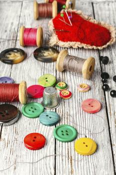 Set of buttons of different colors and sizes from clothing
