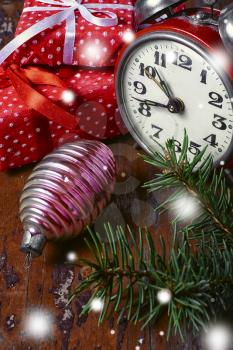 Christmas decoration with clock,fir toys and gifts