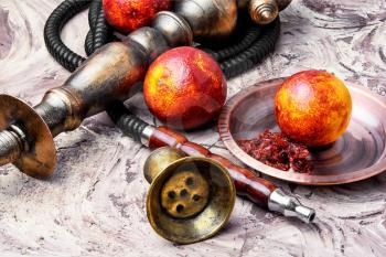 Turkish hookah tobacco with the taste of red orange
