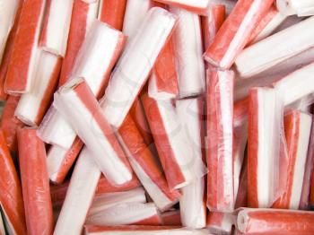 A pile of beautiful crab sticks on a counter