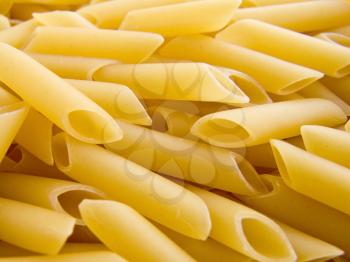 food background a pile of beautiful pasta tubules