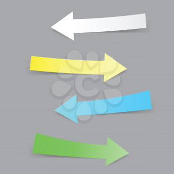 Collection of multicolored paper arrows with shadow on the gray background