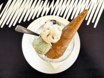 Ice cream serving on cafe table. Dessert summer cold food