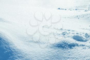 Snow cover winter background. Fresh snowdrift backdrop. Snowy covered landscape. Ice snowflake texture