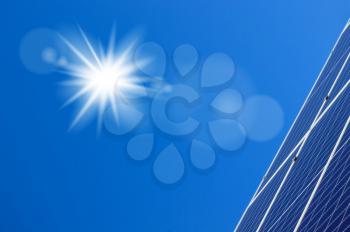 Solar panels sun and blue sky background. Sunlight clean energy power. Renewable green cheap electricity