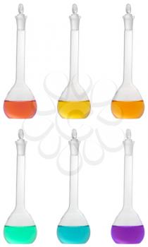 Isolated chemical volumetric flasks with colored solution, studio shot, combined photo