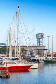 Sailing yachts are moored in Port of Barcelona, Spain