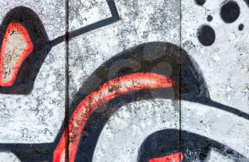 Abstract graffiti fragment over old gray concrete wall