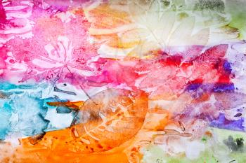 Abstract artistic watercolor background with autumn leaf prints on paper