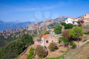 Rural landscape, small living houses in mountains. Piana, South Corsica, France