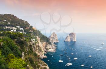 Capri, Italy. Mediterranean Sea coastal landscape with coastal rocks and yachts
