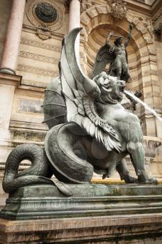 Winged lion, Fontaine Saint-Michel, Paris, France. Popular historical landmark. Vintage toned retro stylized photo filter