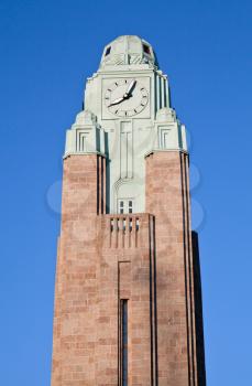Clock tower of Helsinki central railway station. Finland