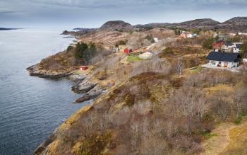 Traditional coastal Norwegian village with colorful wooden houses