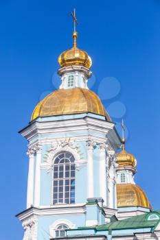 Orthodox St. Nicholas Naval Cathedral, facade fragment with golden domes, Saint-Petersburg, Russia