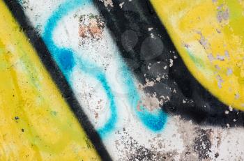 Abstract colorful graffiti fragment over old urban concrete wall
