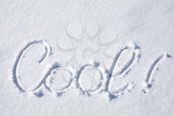 Cool! Hand drawn text on fresh white snow 