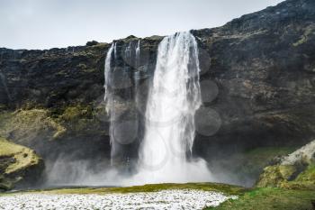 Natural wild landscape of Seljalandfoss waterfall, one of the most popular natural landmark of Icelandic nature