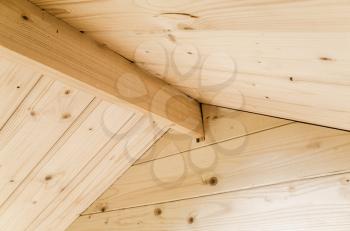 Abstract wooden interior fragment, inner beam of a rooftop