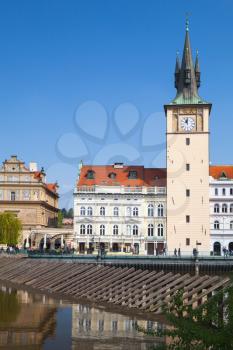 Old Prague in summer day. Old water tower. Czech Republic. Vertical photo