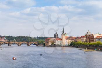Old Prague view in summer day. Vltava river, Charles Bridge, Smetana Museum and old water tower. Czech Republic