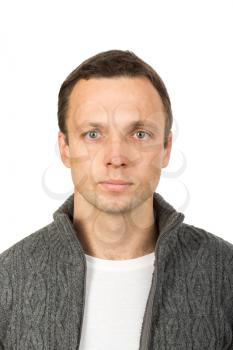 Closeup studio face portrait of young European man isolated on white background