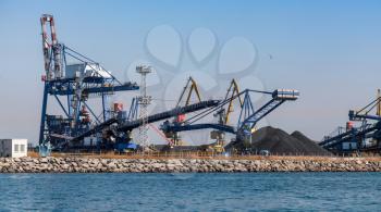 Gantry and bulk cranes are in Port of Burgas, Black Sea, Bulgaria