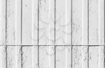 Old white corrugated metal wall, frontal background photo texture