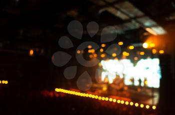 Blurred photo background, life music concert hall with colorful illumination