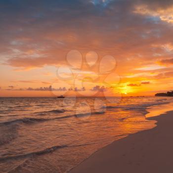 Colorful sunrise over Atlantic Ocean. Bavaro beach. Dominican Republic, coastal morning landscape
