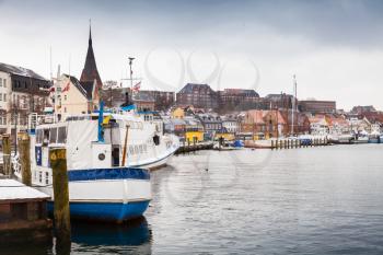 Pleasure boats moored in winter port of Flensburg, Germany