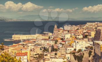 Cityscape of old part Gaeta town in summertime, Italy. Vintage warm tonal correction photo filter, old style effect
