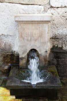 Ancient potable water source in ruined Roman temple of Agora, Smyrna, Izmir, Turkey
