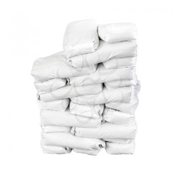 Stack of paper bags with cement isolated on white