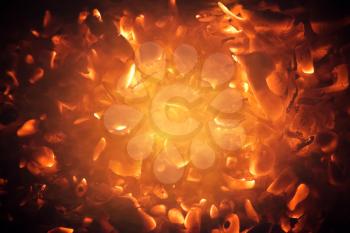 Bright burning coals abstract photo background