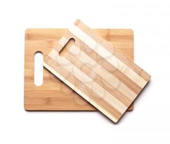 New cutting boards made of bamboo planks on white table background with shadow