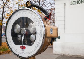Vienna, Austria - November 3, 2015: Outdoor vintage pay scales on the street of European city