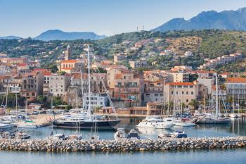 Coastal landscape of Propriano with sailing yachts and motor boats, South region of Corsica island, France