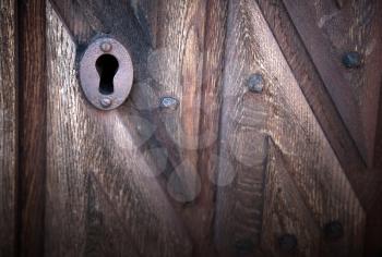 Abstract texture: vintage door fragment with keyhole
