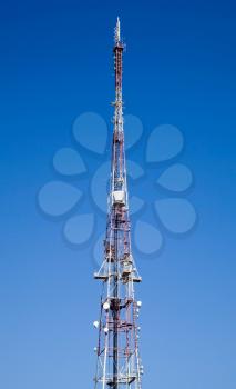 Mobile phone communication tower with devices