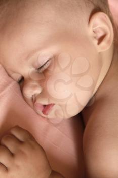 Closeup portrait of Little baby sleeping in the bed