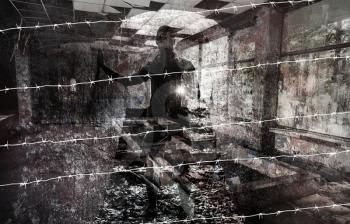 Conceptual photo collage with man silhouette in grungy interior with barbed wire pattern
